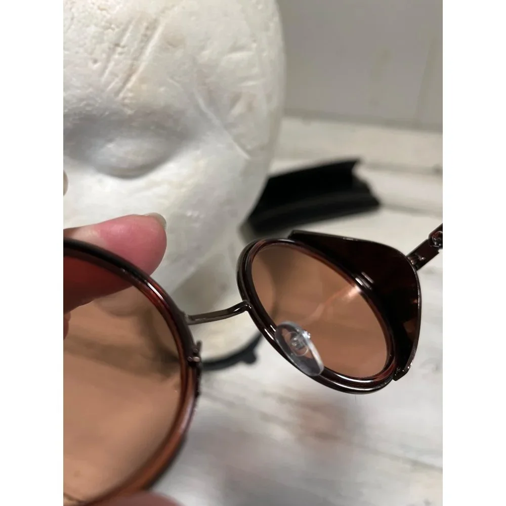 Glasses round amber tinted with black case